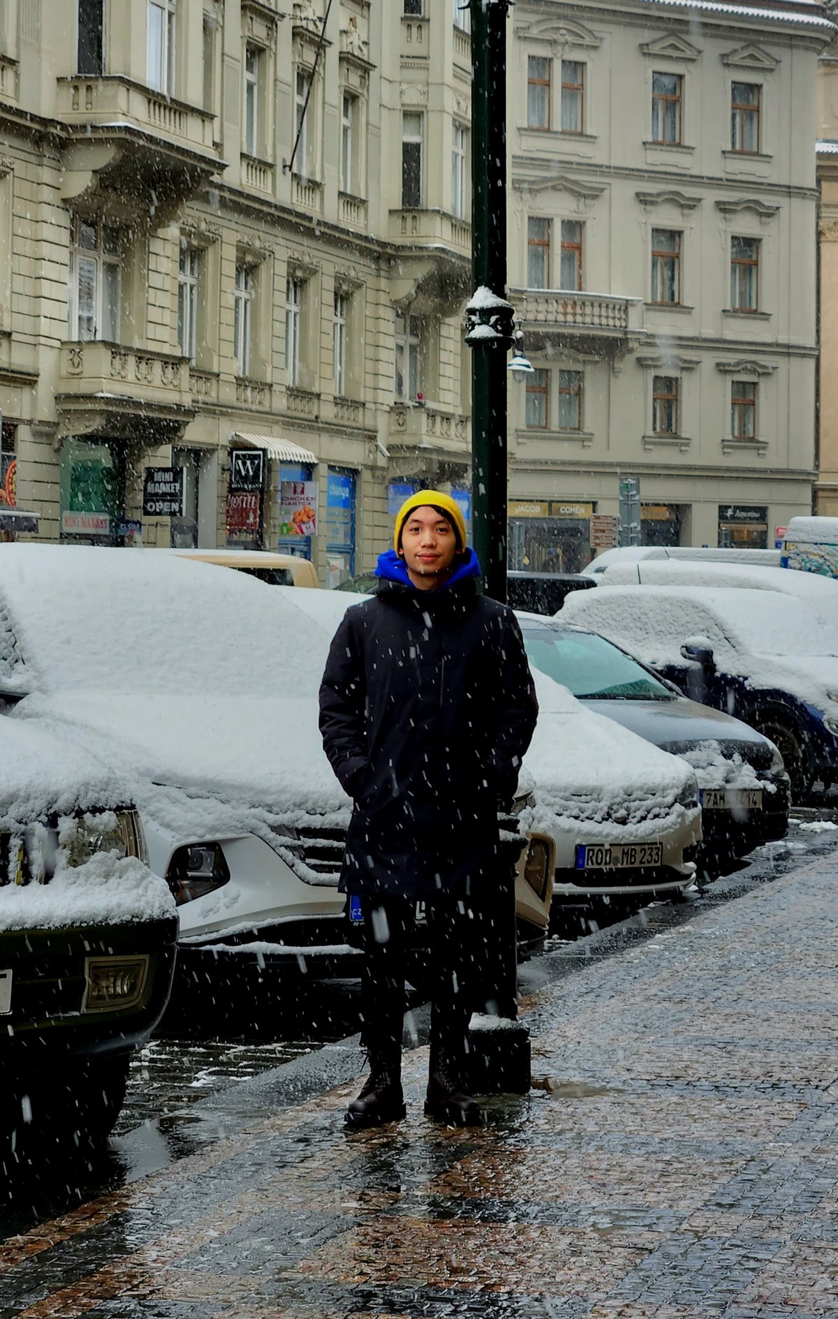 Louis in a snowy European street